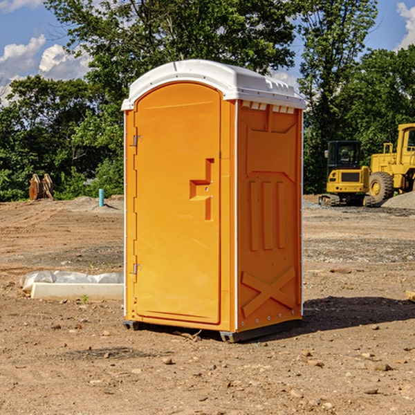 how often are the portable restrooms cleaned and serviced during a rental period in Williams OR